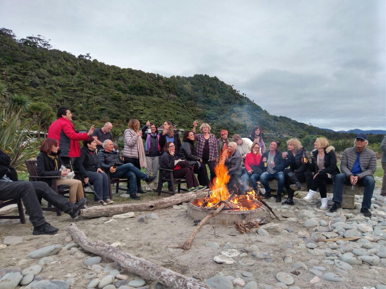 Smiling group of travellers on a Mercury Pacific guided coach tour in New Zealand